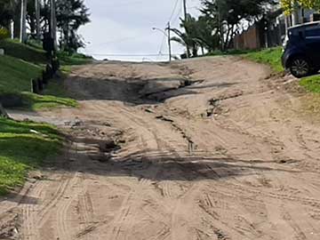 Las consecuencias de la lluvia en el paseo 112, altura 118